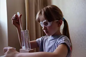 Tableware Prints: a girl in goggles conducts chemical experiments at home