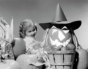 Bucket Prints: Girl around Halloween decorations, studio shot