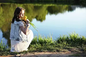Freude Prints: Girl in the park in the spring Girl in the park in the evening of a sunny day in the spring