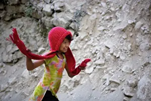 Nepal Prints: Girl running by taking his scarf Annapurna Nepal