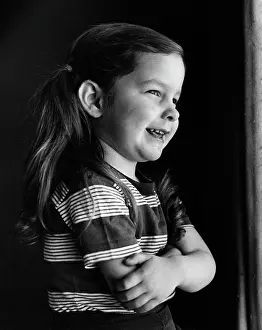 Looking Through Window Prints: Girl seated near window with hands folded