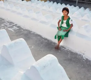 One Child Only Prints: Girl sitting at a temple, Mandalay, Myanmar