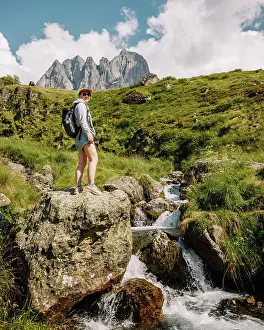 Traveller Prints: Girl traveler on big stone near waterfall, Juta, Georgia
