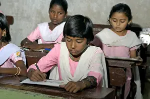 Students Prints: Girls in classroom of school at Ralegan Siddhi near Pune, Maharashtra, India