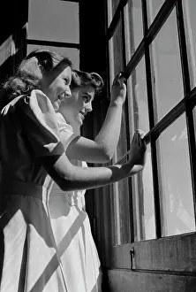 Curiosity Prints: Two girls looking out window