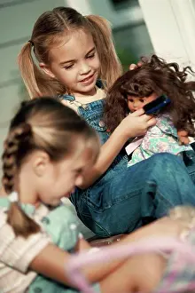 4 5 Years Prints: Two girls playing with their dolls