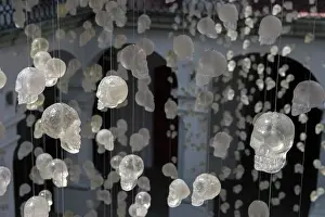 2018 Prints: Glass skulls hanging on strings in the courtyard of the Museo de los Pintores Oaxaquenos in Oaxaca City