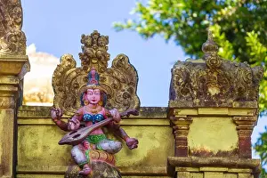 Colourful Prints: God sculpture in traditional Hindu Temple in Sri Lanka