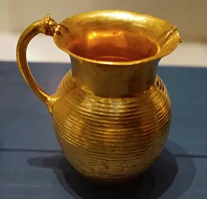 Gold Prints: Golden jug with horizontal fluting, typical of Achaemenid metal work. Dated 5th Century BC