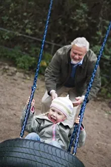 Swedish Prints: Grandfather, grandchild and a swing, Sweden