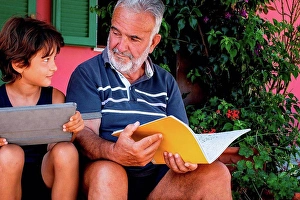 Documentation Prints: Grandfather sitting with grandson on front door steps