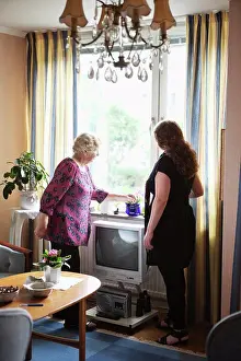 Grandma Prints: Grandma and grandchild looking out of window