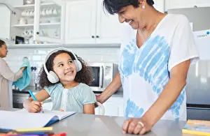 Notes Prints: Grandmother, child and laptop for education at house with headphones
