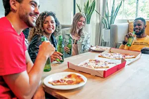 Celebrate Prints: Group of friends having fun while eating pizza and drinking beer together. Friends concept