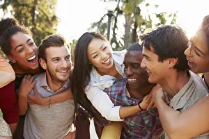 Mixed Prints: Group Of Friends Having Fun Together Outdoors