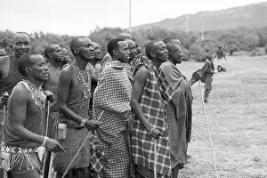 Maasai Prints: Group of Maasai Men in Traditional Dance Outdoors in Black and White