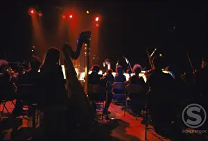 Spotlight Prints: Group of musicians performing in a theater