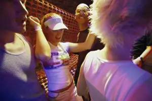 Bald Prints: Group of people dancing at a nightclub