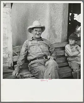 One of a group of western Oklahoma wheat farmers congregated at crossroads service station