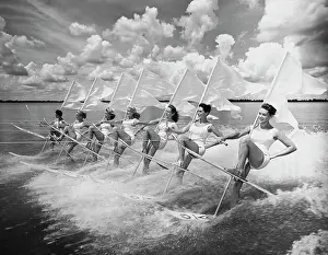 Only Women Prints: Group of women waterskiing in the sea