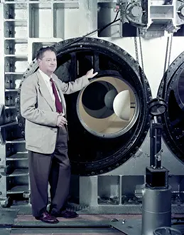 H. Julian Harvey Allen in front of the NASA Ames 8_x_7 foot Supersonic Wind Tunnel test section