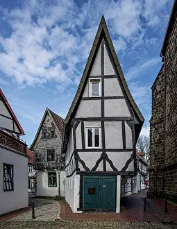 Outdoor Shot Prints: Half-timbered Windloch house from the 15th century in the old town of Minden