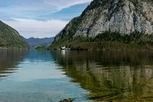 Pure Prints: Hallstatt Austria. Serene Alpine Lake Surrounded by Steep Mountain Ranges Reflecting In Clear Turquoise Water