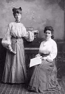 Elegance Prints: Hancock, Michigan: c. 1900 Two young women in Victorian dress in front of an organ with sheet music