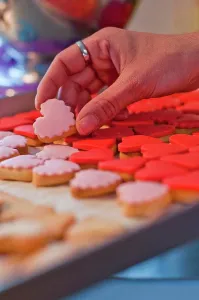 Biscuit Prints: Hand Holding Heart-Shaped Cookie