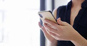 Financial Prints: Hands, communication and texting with smartphone