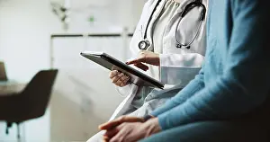 Hands, doctor and patient with tablet