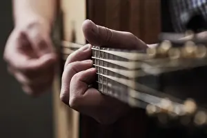 Talent Prints: Hands, home and man with guitar