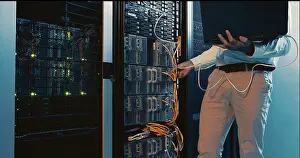 System Prints: Hands, laptop and system test in server room for diagnostics