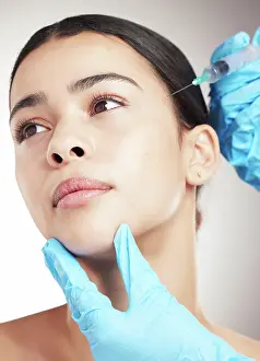 Lifting Prints: Hands, woman and needle for plastic surgery in studio with facial implant