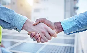 System Prints: Handshake, engineering and teamwork with people and solar panels for partnership