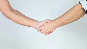 2014 Prints: Handshake Two Man Handshake at White Background Copyright: xZoonar