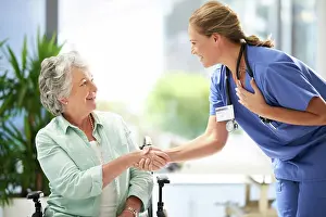 Personal Prints: Handshake, nurse and senior advice in wheelchair with medical results and surgery success news