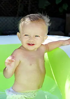 Babe Prints: Happy Baby Boy in the Pool Playful Baby Boy in the Pool at Sunny Summer Day