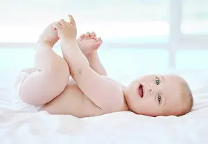 Motor Prints: Happy, baby and portrait on bed for game