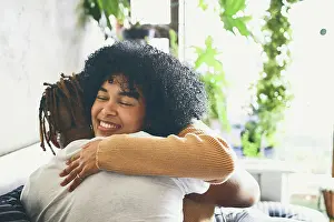 Connect Prints: Happy, black couple and relax with hug at house for love
