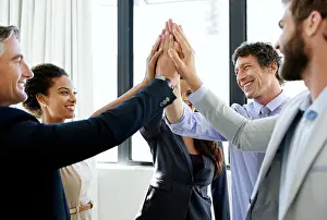 Happy, business people and meeting with high five for unity
