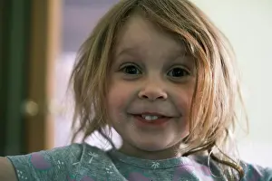 Red Hair Prints: Happy child smiling directly at camera