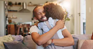 Fatherhood Prints: Happy dad, hug and son with love on sofa for embrace