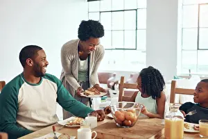 Eggs Prints: Happy family, parents and children for breakfast in home with serving