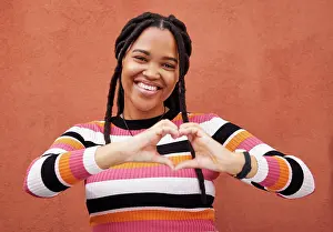 Emoji Prints: Happy, heart and portrait black woman by a wall in the city while on a walk on a weekend trip