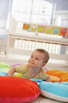 Alter Prints: Happy infant on playmat Happy cute infant lying on playmat