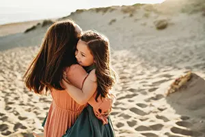 Grandma Prints: Happy Mother daughter hugging smiling beach summer sunset