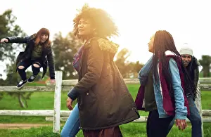 Happy People Prints: Happy people, friends and jumping with fence on grass field for summer fun