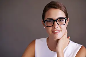 Trendy Prints: Happy woman, portrait and glasses with frame in studio and trendy eyewear for optometry