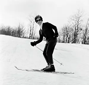 Bare Tree Prints: Happy woman skiing